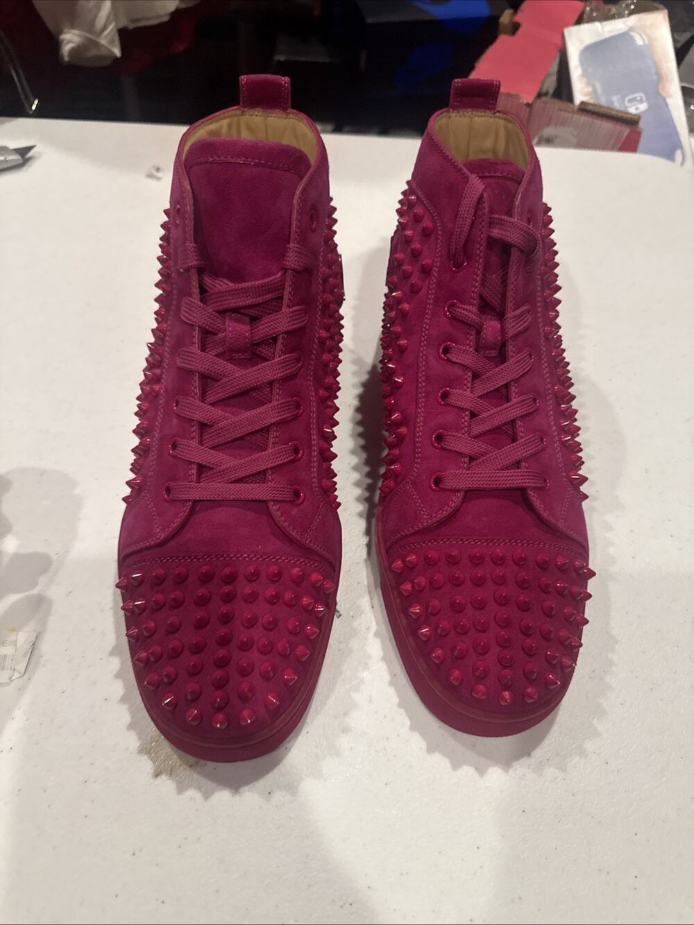 Christian Louboutin Lou Spikes high-top sneakers in a fuchsia Size 43.5 (10.5)